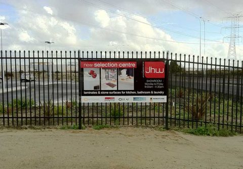 Signs-on-a-fence